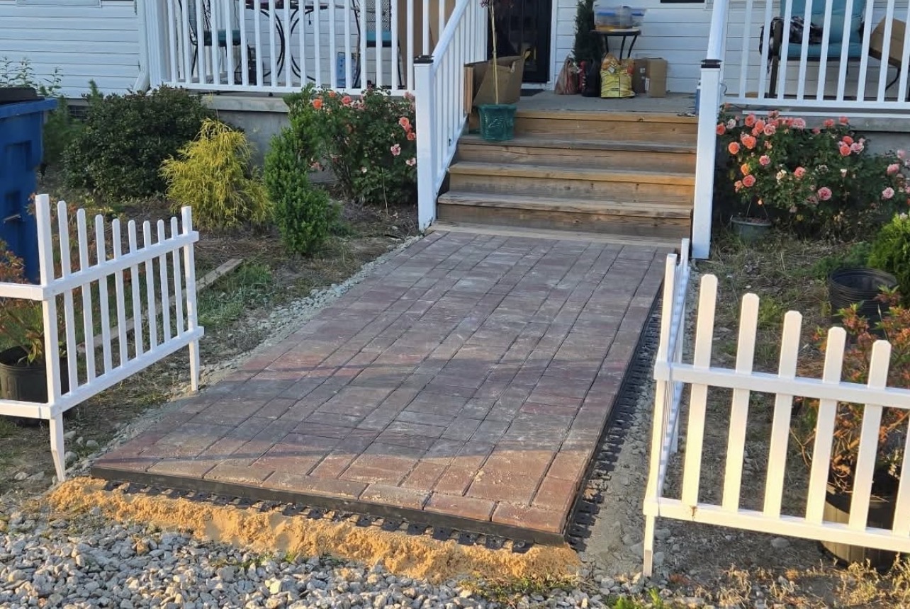Custom paver walkway leading to a front porch